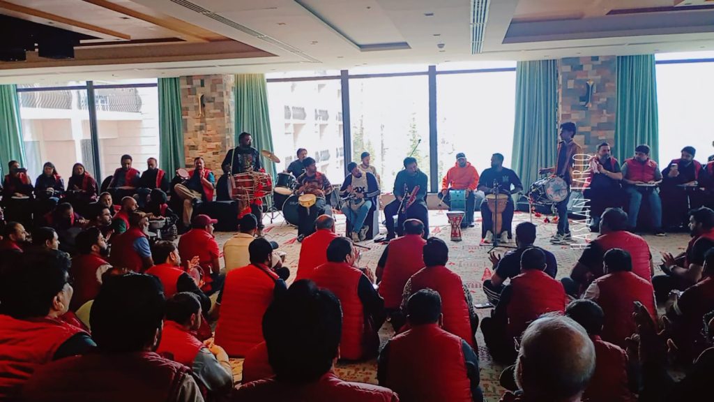 Team building drum circle session in Lahore office